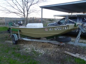 A small fishing boat on its trailer