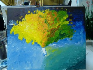 The tree painted in, with yellow, orange and green