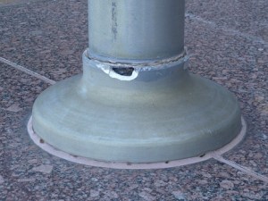 Squirrel Snacks (4) Another flag pole base with a hole in it, that the squirrel chewed