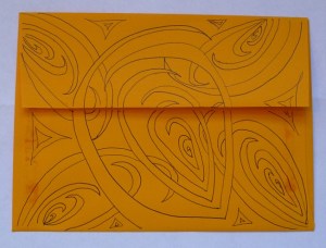 An envelope decorated with a Zentangle design