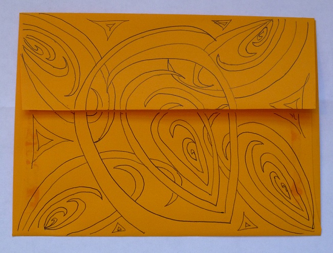 An envelope decorated with a Zentangle design