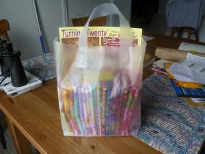 Hand Made Gift A gift bag with fabric and pattern for a quilt