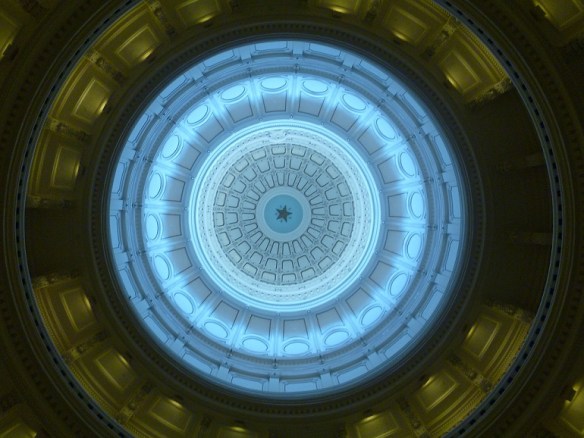 Inside the Texas Capitol building, looking straight up into the dome