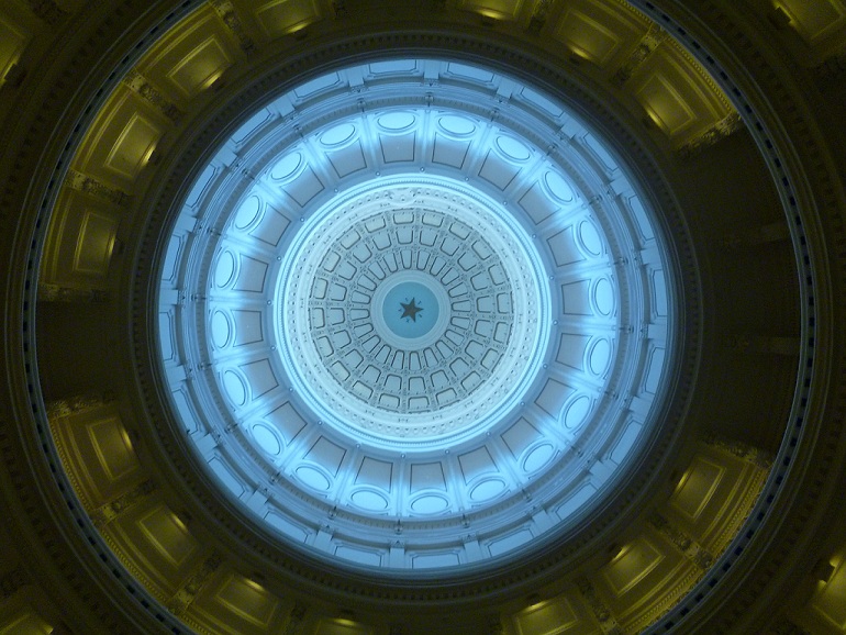 Inside the Texas Capitol building, looking straight up into the dome