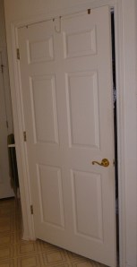 Happy Photos (4) Closet door, leading to a messy closet