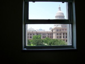 The window from my cubicle overlooking the Texas Capitol building
