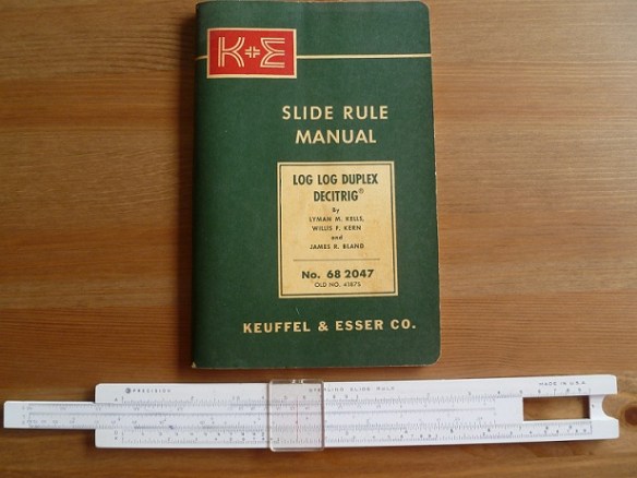 A slide rule and instruction book