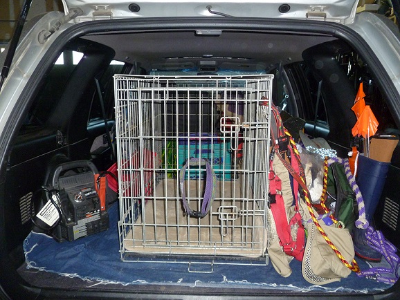 My vehicle loaded up with a dog crate and gear