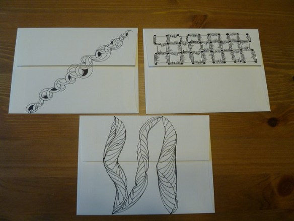 backs of envelopes decorated with Zentangles
