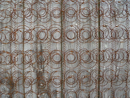 Bed coils as yard art