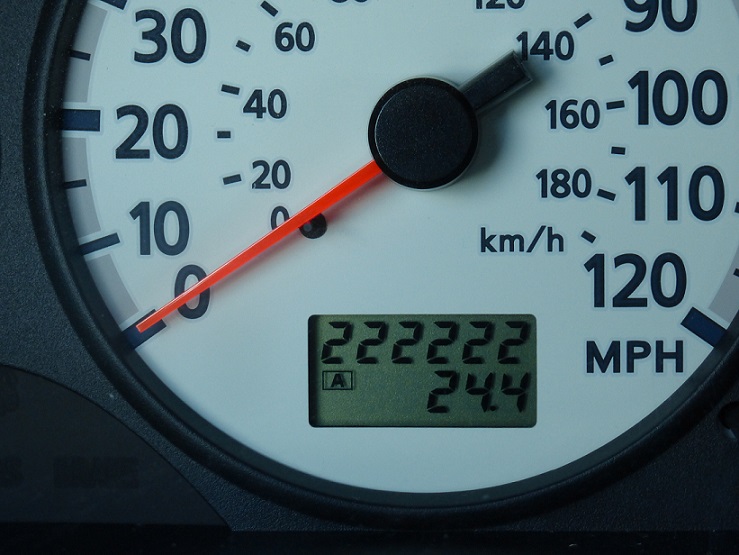 An odometer reading 222,222 miles