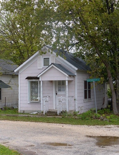 An old, small ranch hand house