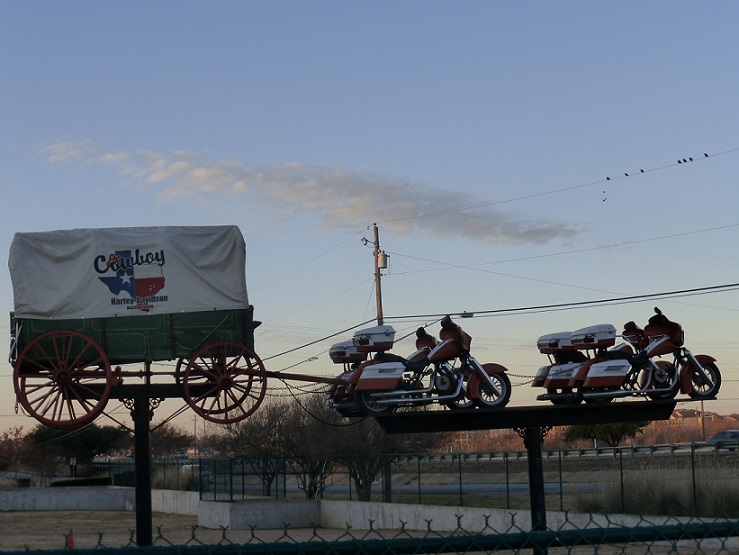 Covered wagon with 4 motorcycles