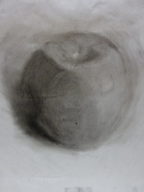 A charcoal sketch of an apple