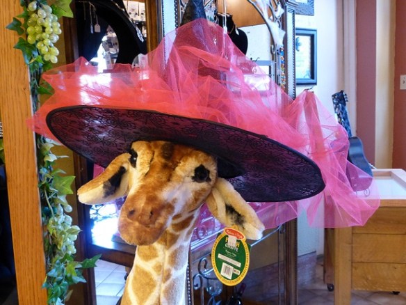 Stuffed giraffe toy with hat