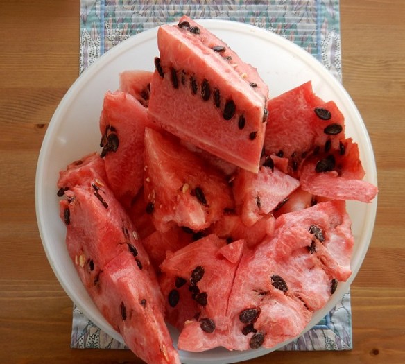 A cut-up watermelon in a large bowl.