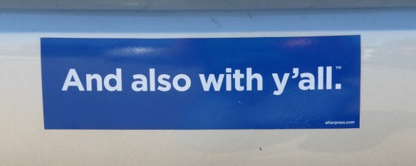 A bumper sticker with the phrase "And also with y'all"