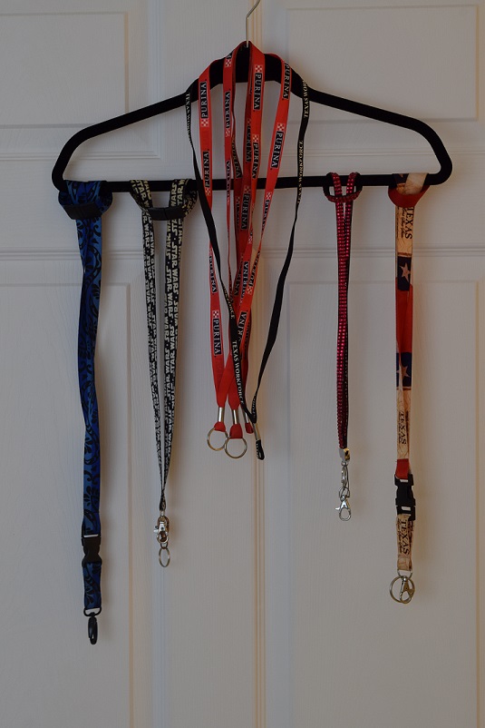 Lanyard collection, several lanyards hanging from a close hanger