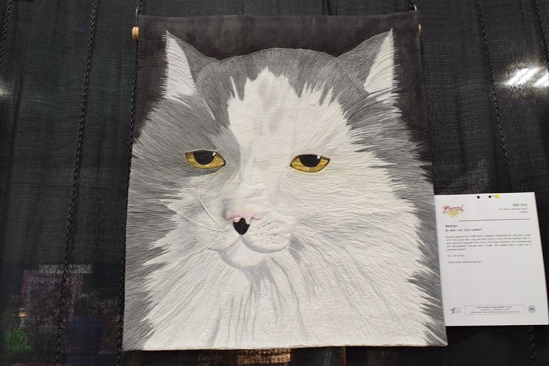 An art quilt of a cat, quilt created by Mary Ann Vaca-Lambert