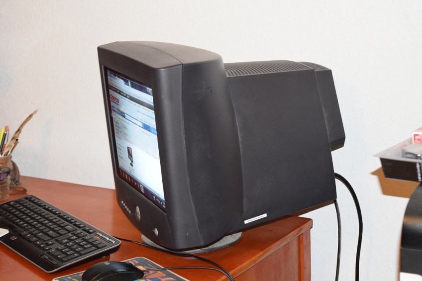 An old computer monitor that is large and bulky, but still works