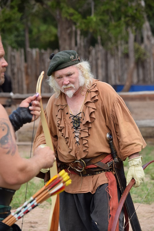 An archer approaching the line