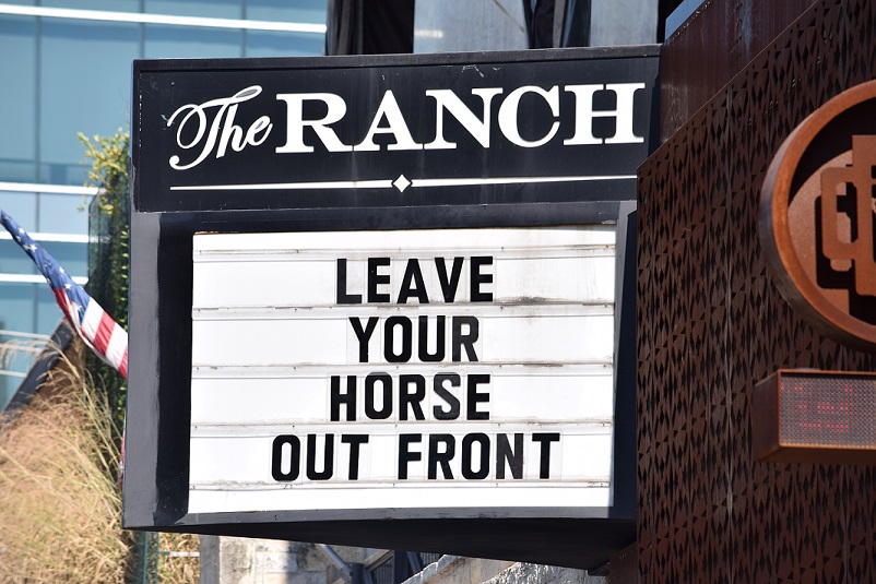 Sign that reads Leave Your Horse Outside