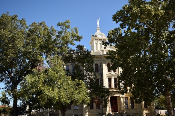 South view of the Milam County Courthouse, with lots of trees