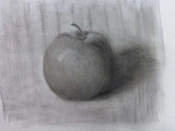 A charcoal sketch of an apple