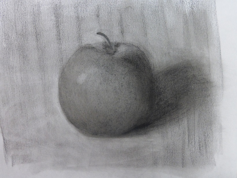 A charcoal sketch of an apple
