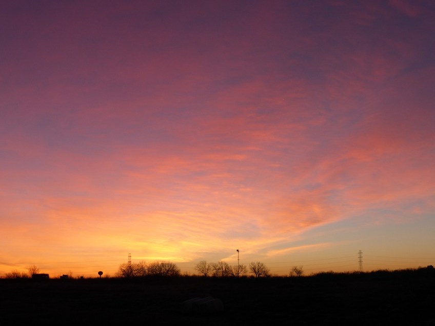 A sunrise, very pink and a little yellow