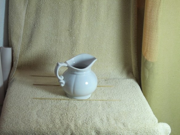 Sketching object: a small, white roundish pitcher with curlicue handles