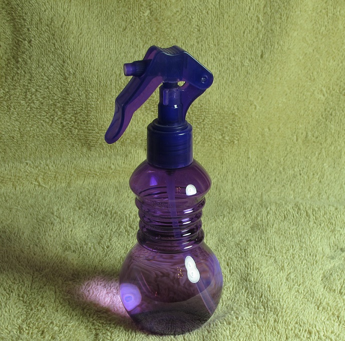 Purple spray water bottle