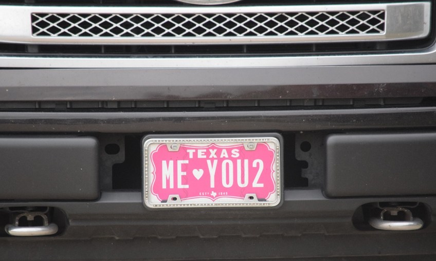 A personalized Texas license plate that says "Me Heart You 2"