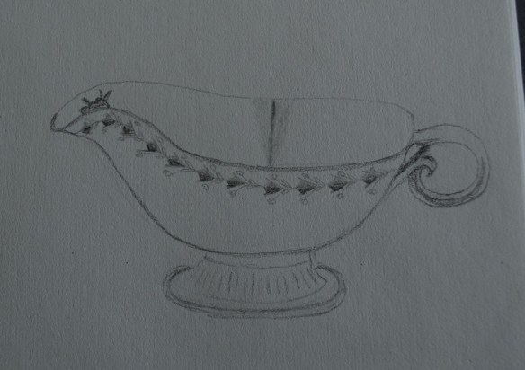 A cracked gravy boat