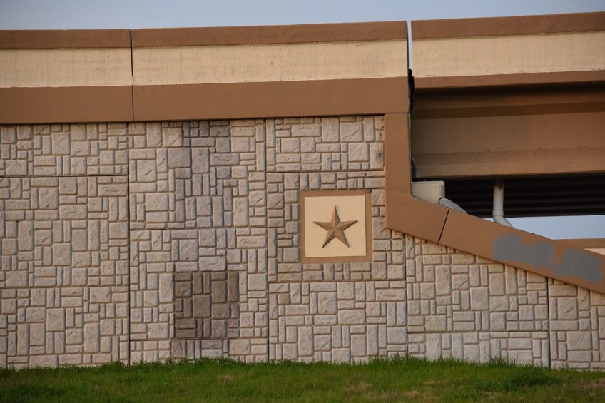 The wall supporting a Texas overpass
