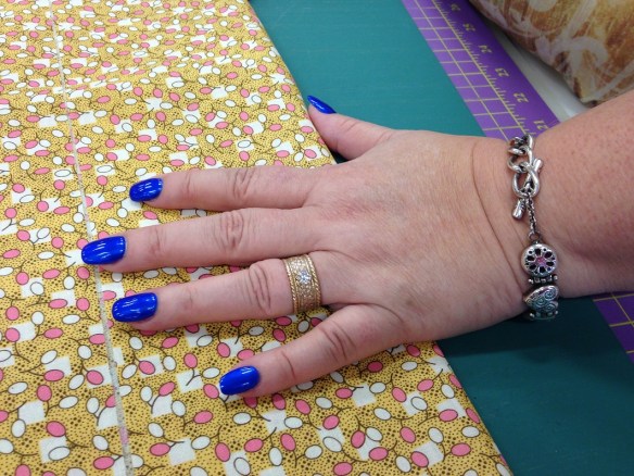 Fingernails with blue nail polish