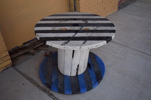 Wooden painted spool in Smithville, Texas