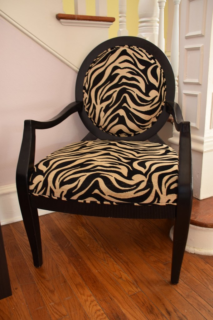 Chair with zebra-striped fabric at a hair salon