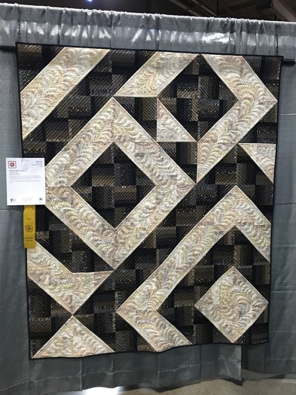 Rockin Rail Fence by Norma Lambert, quilting by Lori Kukuk